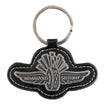 Wing Wheel Flag Leather Keychain in black and silver, close up front view