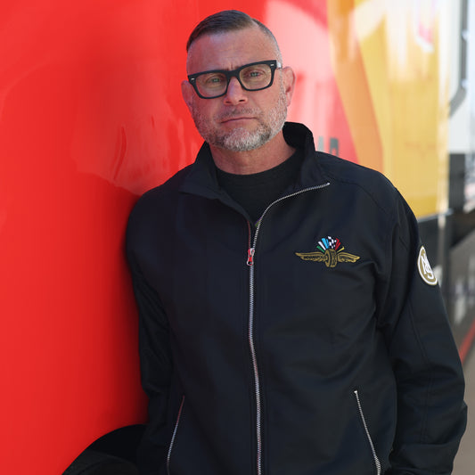 Wing, Wheel, and Flag Lightweight Full Zip Jacket In Black - Front View On Model
