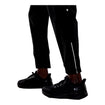 lululemon Wing and Wheel Surge Jogger 29" in black, bottom ankle zipper view